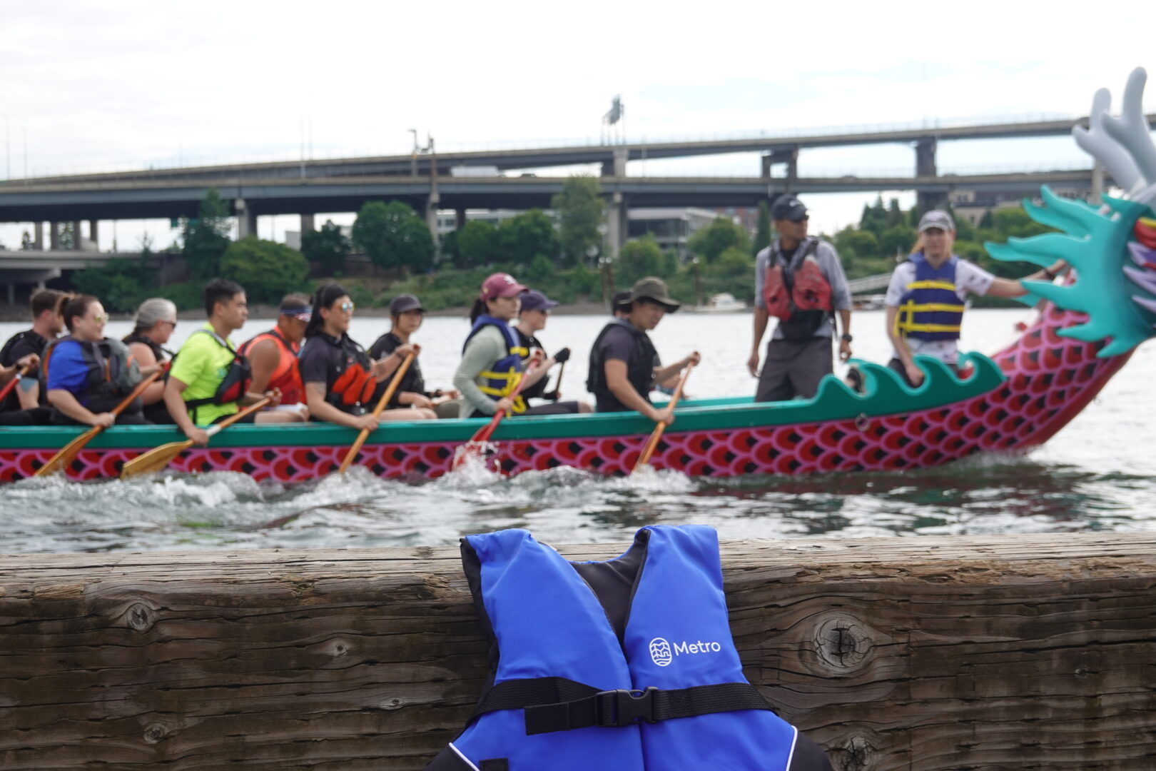 Metro Lifejacket Giveaway with Dragon Boat in Background